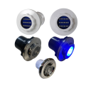 Spa lights including white LED lights with blue circuit boards, black chrome and blue LED underwater lights for spa illumination and ambiance enhancement